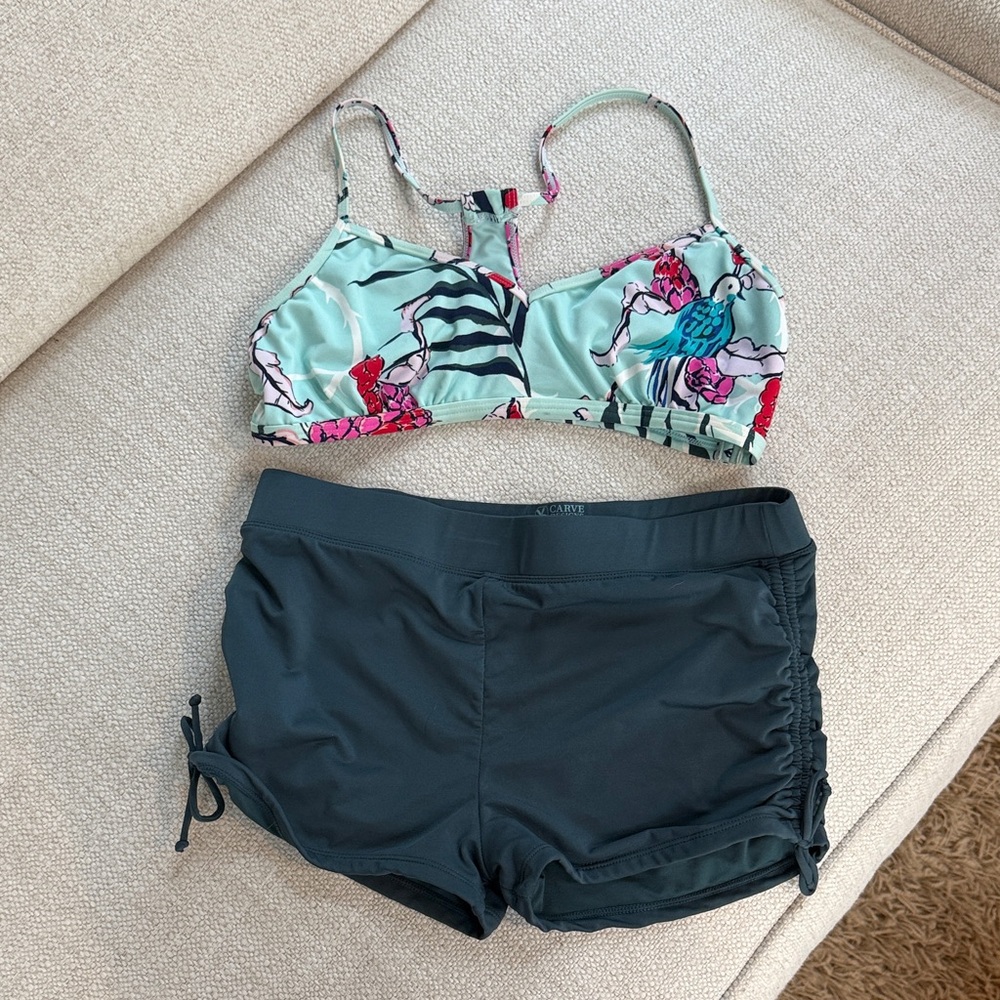 Carve Two Piece. Medium top and small bottom. Worn once!